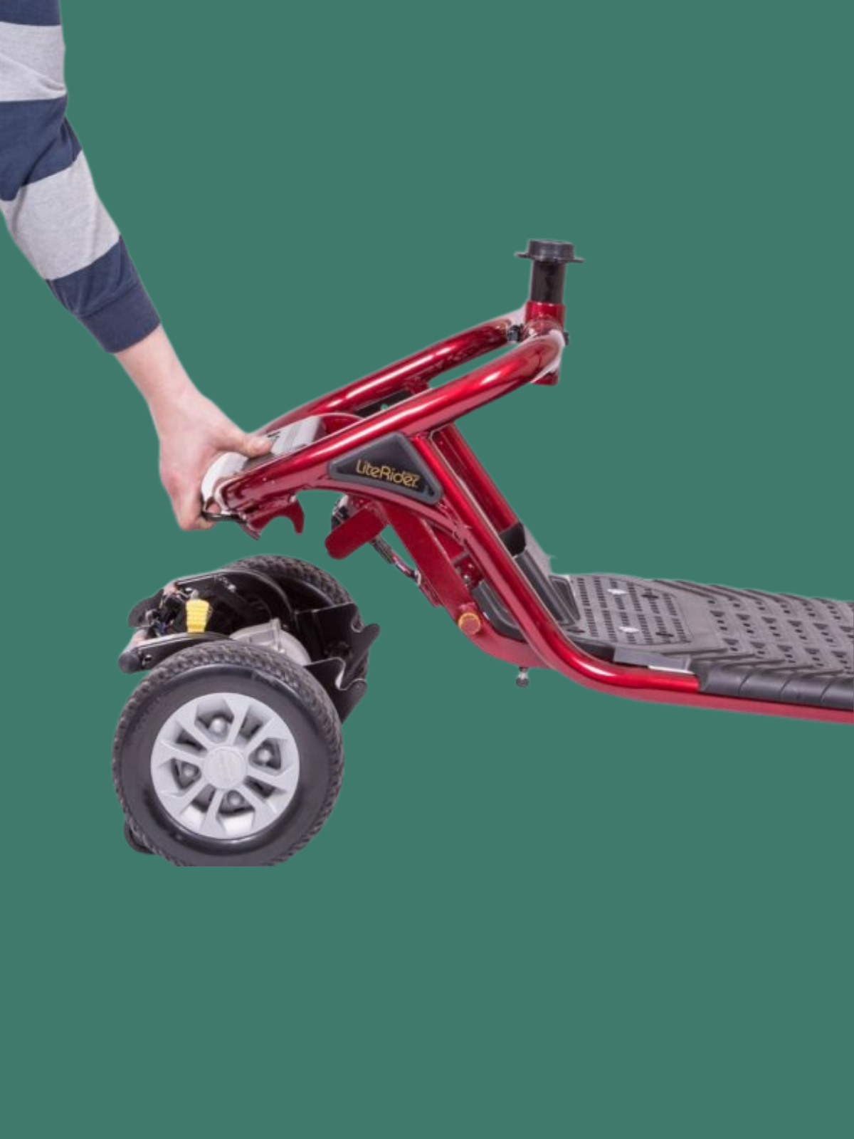 Golden LiteRider scooter frame being separated from the rear drive section for easier lifting, transportation and storage.