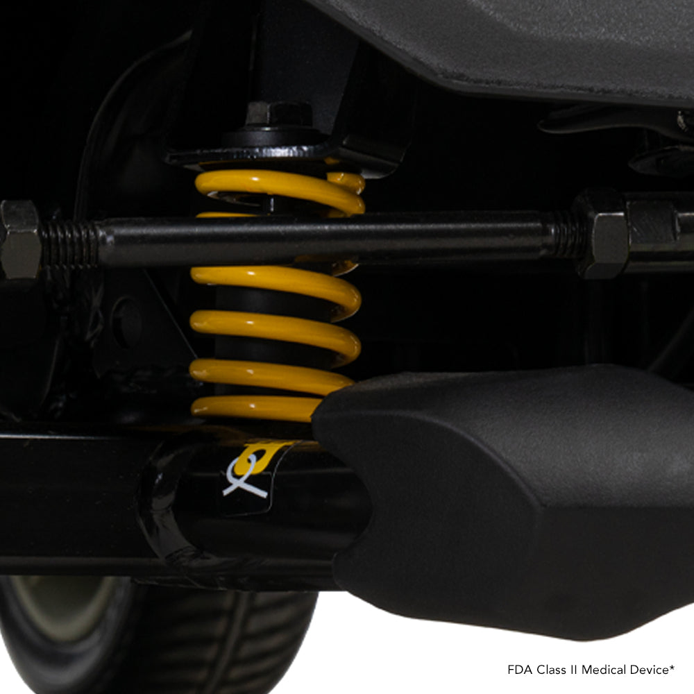 Close-up of the Go Go Endurance Li independent suspension designed to absorb bumps for enhanced comfort and stability.