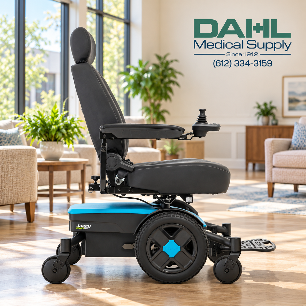 Side view of a blue Jazzy EVO 613 Li powerchair in a sunlit nursing home lounge with large windows, comfortable seating, and the Dahl Medical Supply logo in the top right corner.