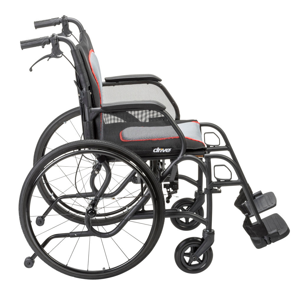 Side view of the black AeroFly wheelchair showing the large rear wheels, armrests, front casters, and footrests.