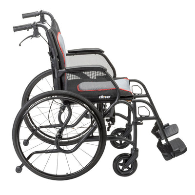 Side view of the black AeroFly wheelchair showing the large rear wheels, armrests, front casters, and footrests.
