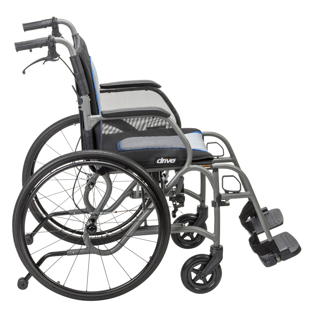 Side view of the gray AeroFly wheelchair showing the large rear wheels, armrests, front casters, and footrests.