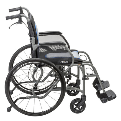 Side view of the gray AeroFly wheelchair showing the large rear wheels, armrests, front casters, and footrests.