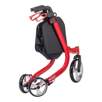 Angled view of the red Drive Nitro rollator folded into a narrow profile with the handles and rear wheels close together.