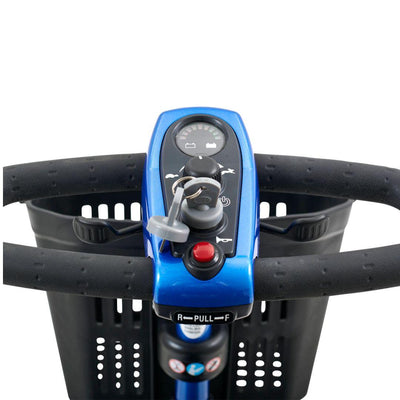 Close-up of the LiteRider’s easy-to-use controls, including the battery gauge, speed dial, key, horn and delta tiller.