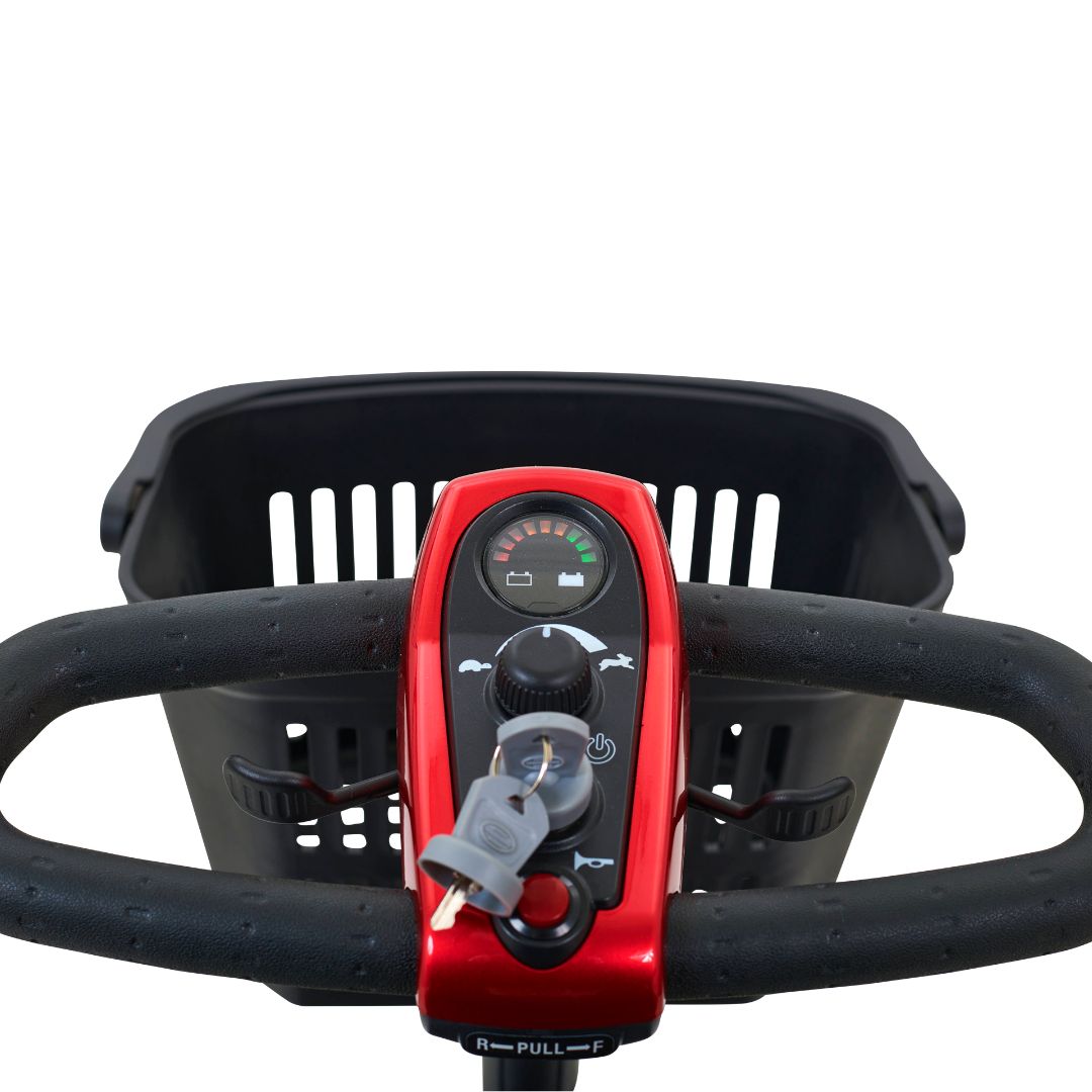 Close-up of the LiteRider scooter controls with a battery gauge, speed adjustment dial, key ignition, horn and easy-to-reach drive levers.
