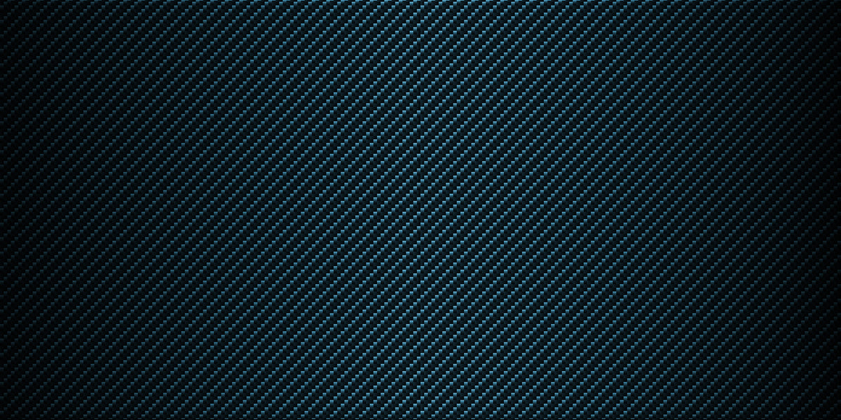 Midnight Blue carbon fiber weave finish detail on the Pride Jazzy Carbon 27.