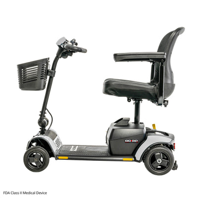 Side profile of the Pride Go Go Elite Traveller 2 travel scooter in White with EZ Turn Technology, front basket, and comfortable seating.