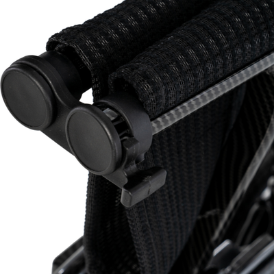 Secure folding lock mechanism keeps the Pride Jazzy Carbon 27X compact and stable during transport and storage.