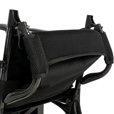 Breathable folding padded backrest provides comfort and support on the Pride Jazzy Carbon 27X folding power chair.