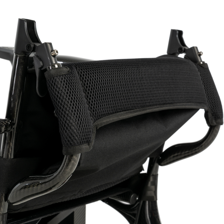 Breathable folding padded backrest provides comfort and support on the Pride Jazzy Carbon 27X folding power chair.