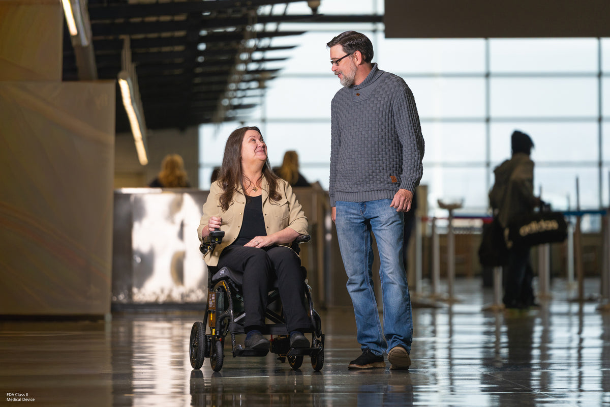 Lightweight folding power chair makes navigating terminals easy and comfortable.