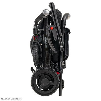 Folded Pride Jazzy Carbon power wheelchair shown from the side for compact storage.