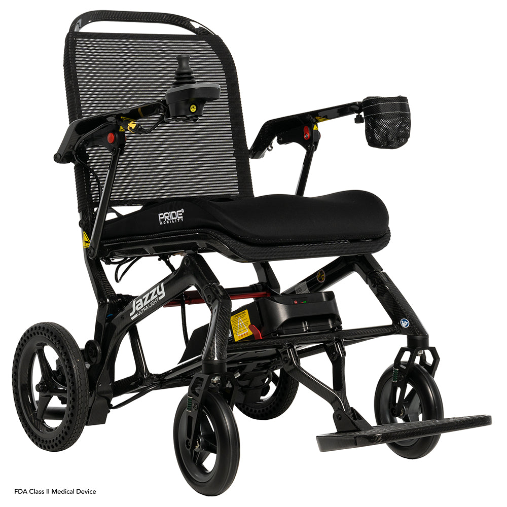 Lightweight folding power wheelchair with carbon fiber styling and joystick control.