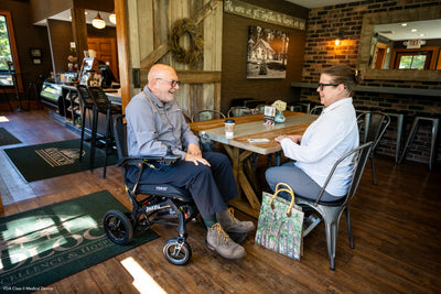 Lightweight power chair helping users stay active and connected with friends.