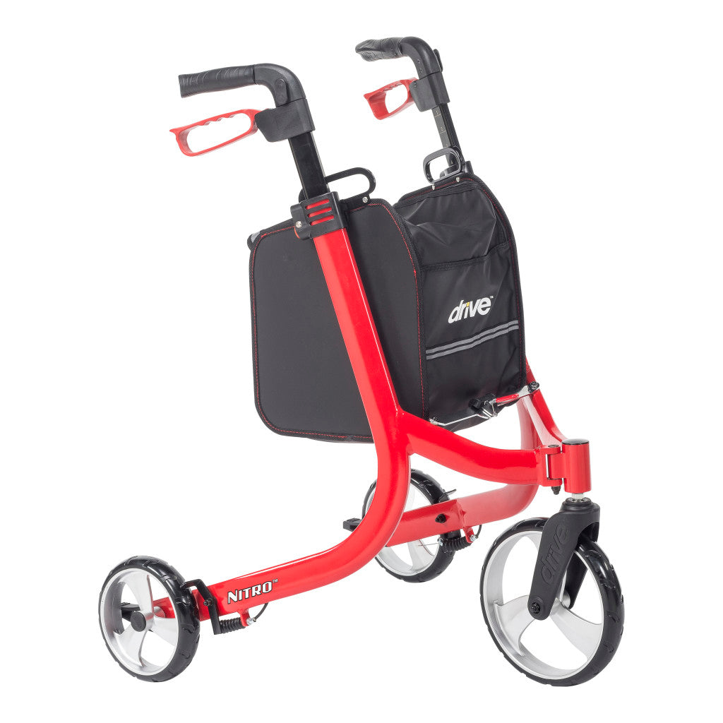 Red Drive Nitro three-wheel rollator with ergonomic handles, hand brakes, and a black storage bag.