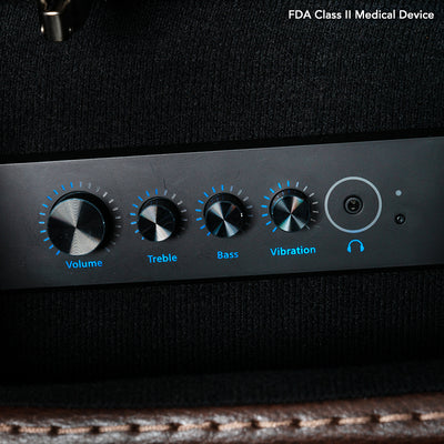 Built-in audio control panel on the VivaLift Premier PLR-5900 with volume, treble, bass, vibration and headphone controls.